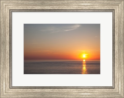 Framed Sunrise over the sea Print