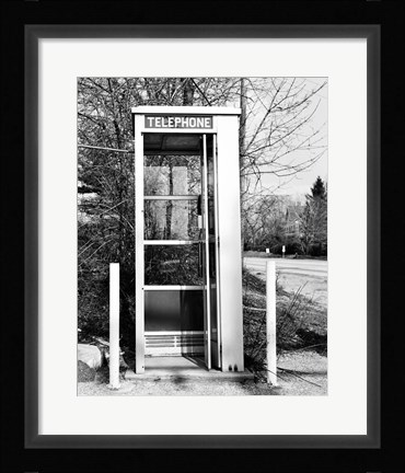 Framed Telephone booth by the road Print