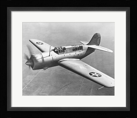 Framed High angle view of a fighter plane in flight, Curtiss SB2C Helldiver, December 1941 Print