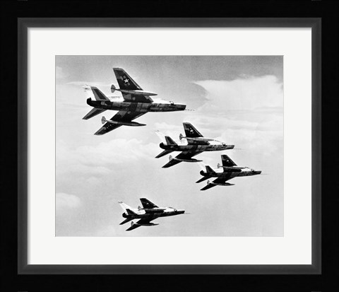 Framed Low angle view of four fighter planes flying in formation, F-100 Super Sabre Print