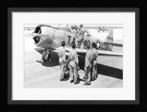 Framed Rear view of four soldiers standing near a fighter plane, T-6 Texan Print