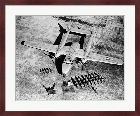 Framed High angle view of soldiers standing near a military airplane, Fairchild C-119 Flying Boxcar Print
