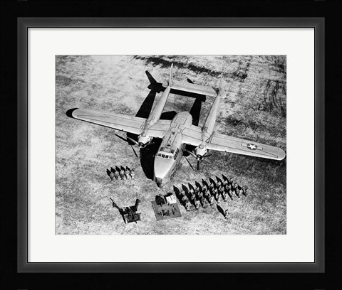 Framed High angle view of soldiers standing near a military airplane, Fairchild C-119 Flying Boxcar Print