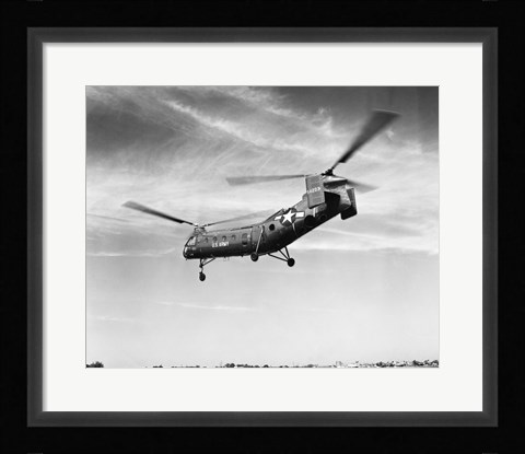 Framed Low angle view of a military helicopter in flight, H-21D Helicopter, US Military Print