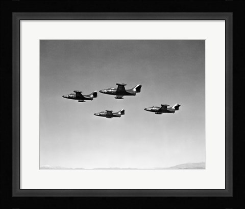 Framed Low angle view of four fighter planes flying in formation, F9F Panther Print