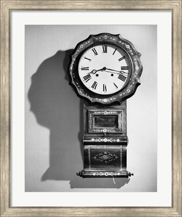 Framed Close-up of clock hanging on wall Print