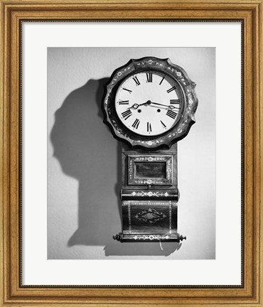 Framed Close-up of clock hanging on wall Print