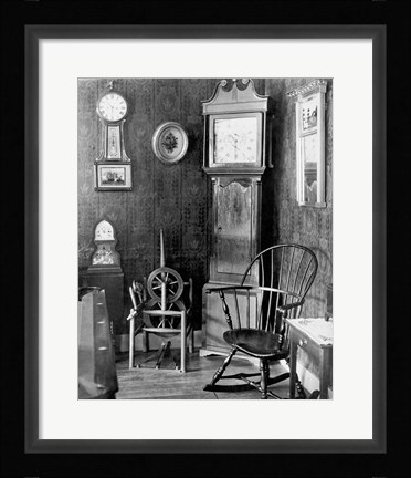 Framed Antique clocks in a living room Print