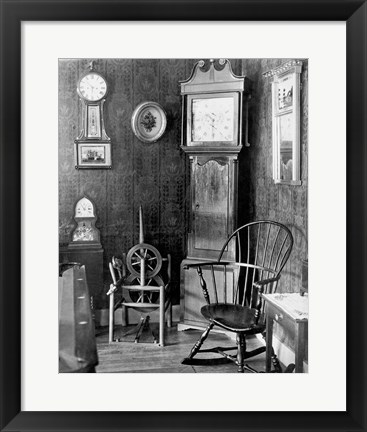 Framed Antique clocks in a living room Print