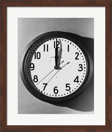 Framed Close-up of a wall clock hanging on a wall Print