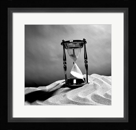 Framed Close up of hourglass on sand Print