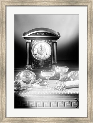 Framed Clock showing 12 o&#39;clock with champagne flutes and party hats in the foreground Print