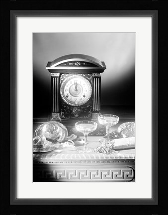 Framed Clock showing 12 o'clock with champagne flutes and party hats in the foreground Print
