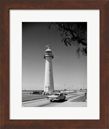 Framed USA, Mississippi, Biloxi, Biloxi Lighthouse with street in the foreground Print