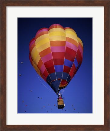 Framed Low angle view of a hot air balloon rising, Albuquerque International Balloon Fiesta, Albuquerque, New Mexico, USA Print