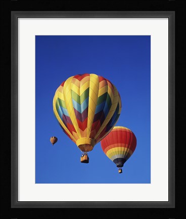 Framed Rainbow Colored Hot Air Balloons Print