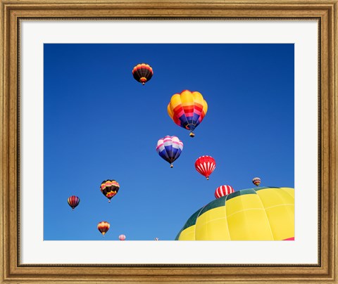 Framed Hot Air Balloons Flying Away in a Group Print