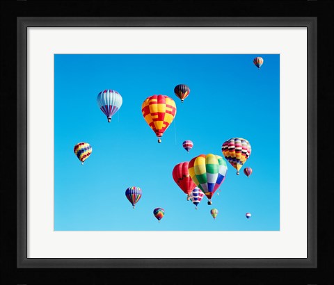 Framed Group of Hot Air Balloons Floating Together in Albuquerque, New Mexico Print