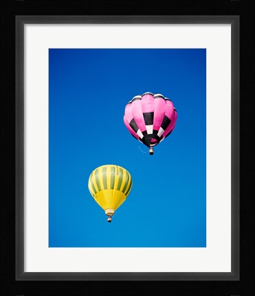 Framed Pink and a Yellow Hot Air Balloon Print