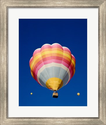 Framed Low Angle Shot of a Rainbow Hot Air Balloon Print