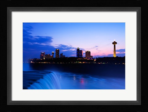 Framed Waterfall with buildings lit up at dusk, American Falls, Niagara Falls, City of Niagara Falls, New York State, USA Print
