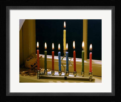 Framed Close-up of a menorah with burning candles and a Star of David Print