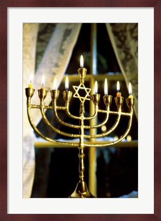 Framed Close-up Of Lit Candles On A Menorah And Window Print
