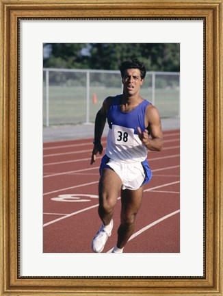 Framed Male athlete running on a running track Print