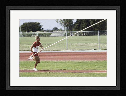 Framed Male athlete pole vaulting Print