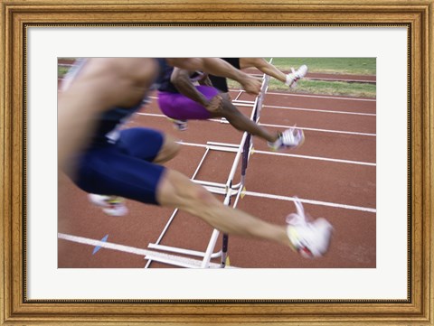 Framed Side profile of three people jumping a hurdle Print