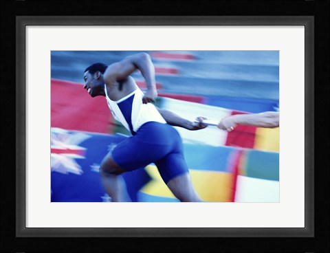 Framed Side profile of runners passing a baton in a relay race Print