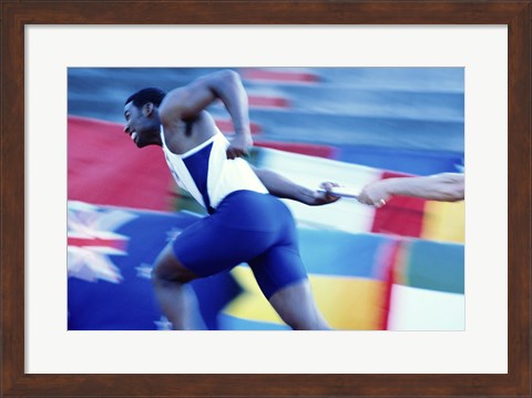Framed Side profile of runners passing a baton in a relay race Print