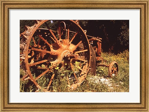 Framed Abandoned Tractor Near Mississippi River Bank Print