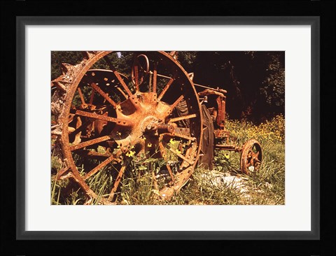 Framed Abandoned Tractor Near Mississippi River Bank Print