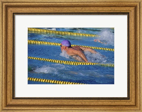 Framed Swimmer racing in a swimming pool Print