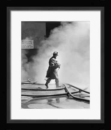 Framed Firefighter walking in front of smoke Print