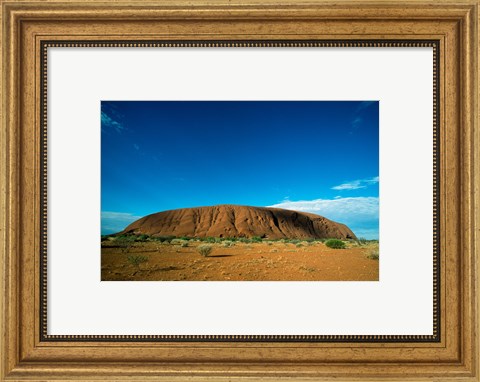Framed Rock formation on a landscape, Ayers Rock, Uluru-Kata Tjuta National Park, Northern Territory, Australia Print