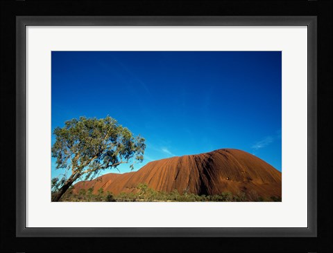 Framed Rock formation on a landscape, Ayers Rock, Uluru-Kata Tjuta National Park, Northern Territory, Australia Print