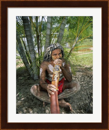 Framed Aborigine playing a didgeridoo, Cairns, Queensland, Australia Print