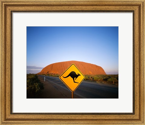 Framed Kangaroo sign on a road with a rock formation in the background, Ayers Rock Print