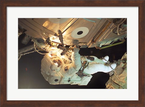 Framed Astronaut Sellers Working on ISS Print