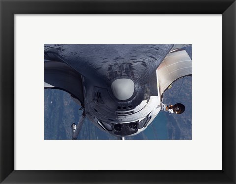 Framed Space Shuttle Discovery as it approached the International Space Station Print