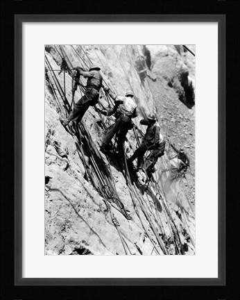 Framed Drillers at work on canyon wall above power plant location Print