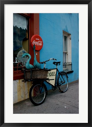 Framed Statues of swans in a basket on a bicycle, Lahinch, Ireland Print