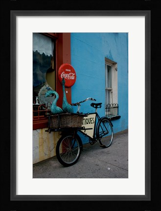 Framed Statues of swans in a basket on a bicycle, Lahinch, Ireland Print