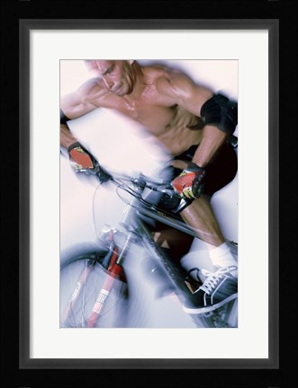 Framed Close-up of a young man riding a bicycle Print