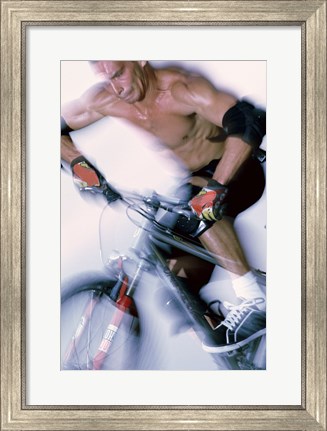 Framed Close-up of a young man riding a bicycle Print