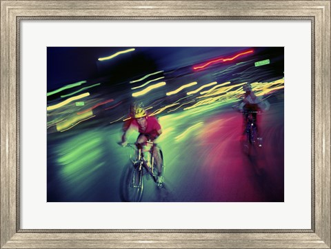 Framed Young man riding a bicycle Print