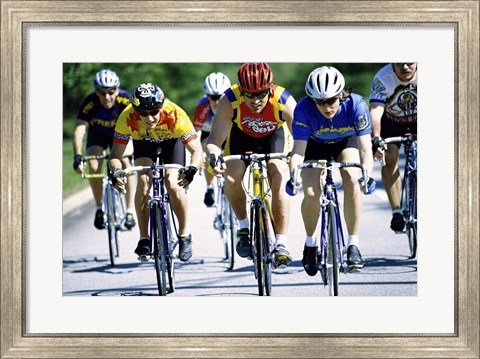 Framed Group of cyclists riding bicycles Print