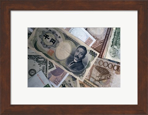 Framed Heap of US and Foreign Currency notes Print